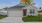 the exterior of a home with a green yard