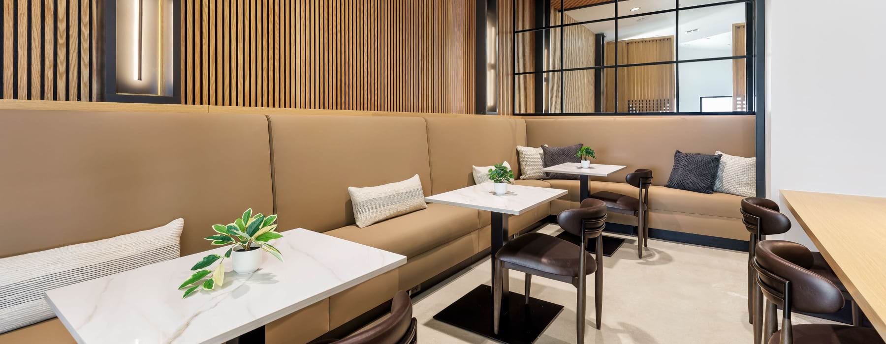 room with booth seating and tables